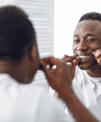 brushing-vs-flossing-blog-image